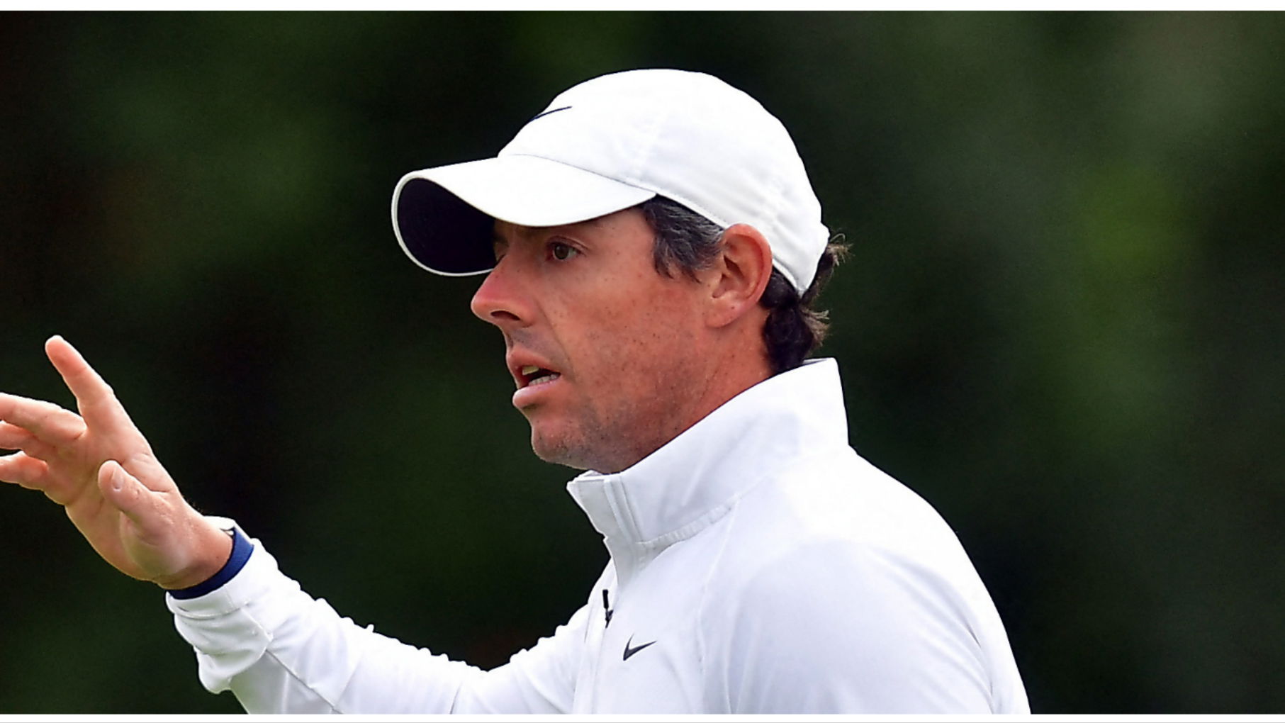 Watch Rory McIlroy's incredible recovery shot off the pine straw, over water!